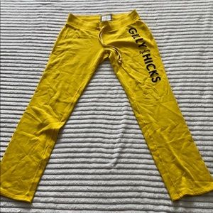 yellow sweatpants with navy lettering